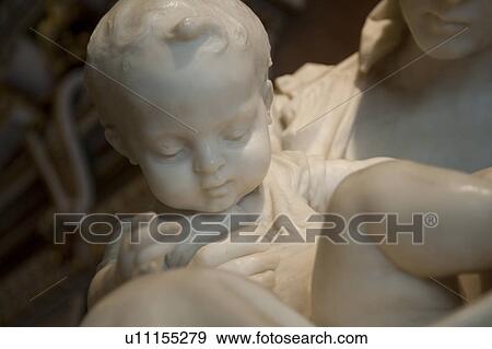 Stock Photo - Marble sculpture of Virgin Mary and Baby Jesus. Fotosearch