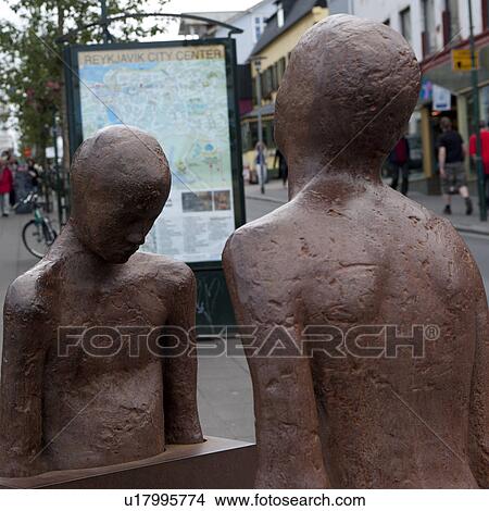 Metal statues of people, urban centre View Large Photo Image Picture - Metal statues of people, urban centre. Fotosearch