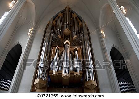 Stock Photo - Organ pipes in vaulted ceiling. Fotosearch