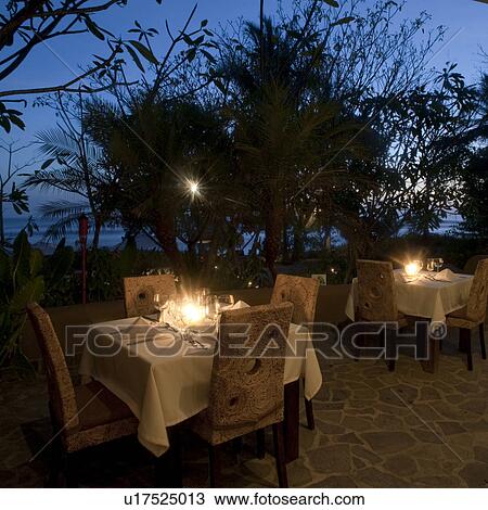 Stock Image - Outdoor dining table in Costa Rica. Fotosearch