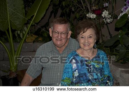 Stock Photo - People posing at the Butterfly Palace in Branson, Missouri. Fotosearch
