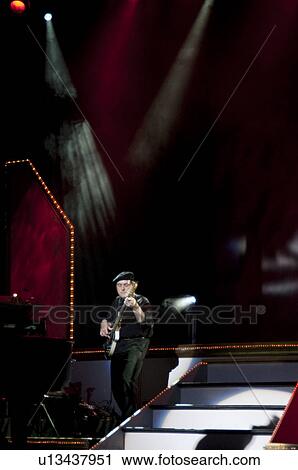 Stock Image - Performer at Dick Clark's Theatre in Branson, Missouri. Fotosearch
