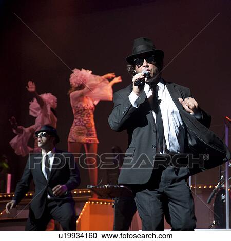 Stock Image - Performer at Dick Clark's Theatre in Branson, Missouri. Fotosearch