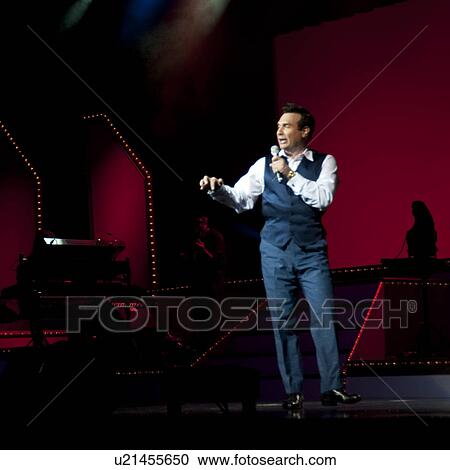 Stock Image - Performer at Dick Clark's Theatre in Branson, Missouri. Fotosearch