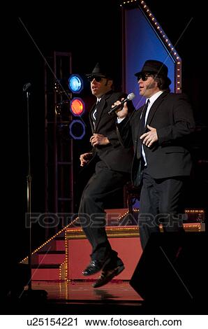 Stock Image - Performer at Dick Clark's Theatre in Branson, Missouri. Fotosearch