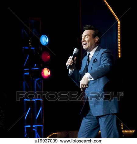 Performer at Dick Clark's Theatre in Branson, Missouri View Large Photo Image Stock Photo - Performer at Dick Clark's Theatre in Branson, Missouri. Fotosearch