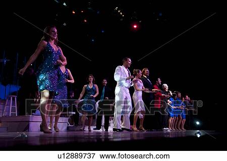 Stock Photo - Performers at the Moon River Theatre in Branson, Missouri. Fotosearch