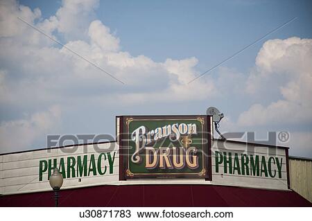 Pharmacy sign in downtown historic district in Branson, Missouri View Large Photo Image Stock Image - Pharmacy sign in downtown historic district in Branson, Missouri. Fotosearch