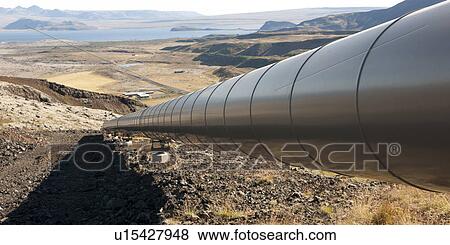 Pipeline and shadow running downhill to valley View Large Photo Image Stock Photo - Pipeline and shadow running downhill to valley. Fotosearch