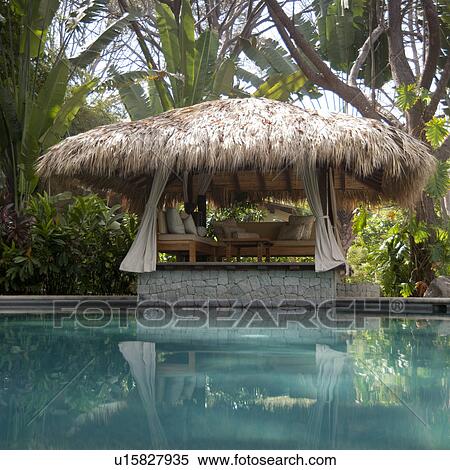 Stock Photography - Poolside cabana in Costa Rica. Fotosearch