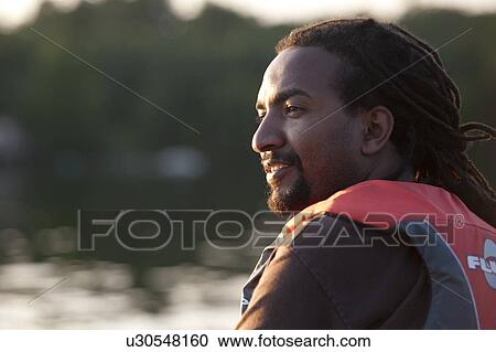 Stock Image - Profile of Africian American man . Fotosearch
