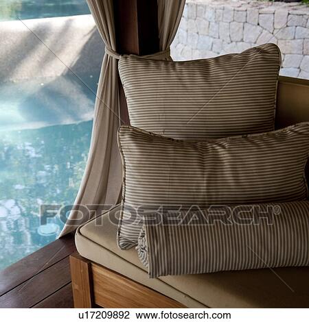 Stock Image - Relaxing pillows in at Florblanca Resort in Costa Rica. Fotosearch