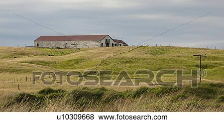 Remote farmland with telephone posed and wire fence View Large Photo Image Stock Photo - Remote farmland with telephone posed and wire fence. Fotosearch