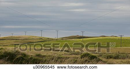 Remote farmland with telephone posed and wire fence View Large Photo Image Stock Photography - Remote farmland with telephone posed and wire fence. Fotosearch