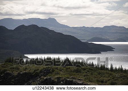 Stock Photo - Rugged mountain and lake landscape Thingvellir National Park. Fotosearch