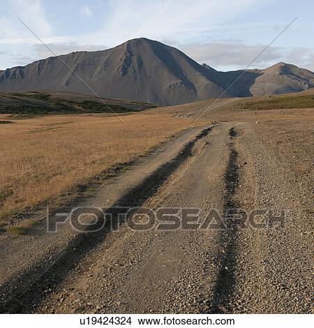 Ruts in dirt road leading to mountain View Large Photo Image Picture - Ruts in dirt road leading to mountain. Fotosearch