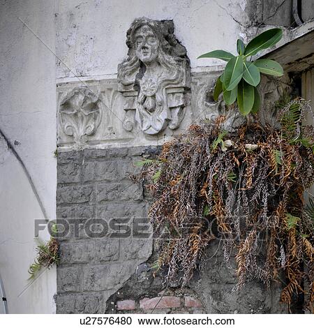 Stock Image - Sculptures on exterior walls in San Jose. Fotosearch