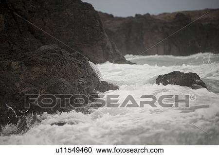 Stock Image - Seascape along Mal Pais coastline in San Jose Costa Rica. Fotosearch