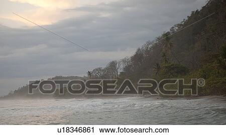 Seascape along Mal Pais coastline in San Jose Costa Rica View Large Photo Image Stock Image - Seascape along Mal Pais coastline in San Jose Costa Rica. Fotosearch