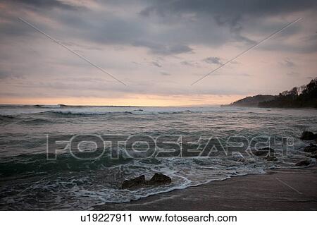 Seascape along Mal Pais coastline in San Jose Costa Rica View Large Photo Image Stock Image - Seascape along Mal Pais coastline in San Jose Costa Rica. Fotosearch