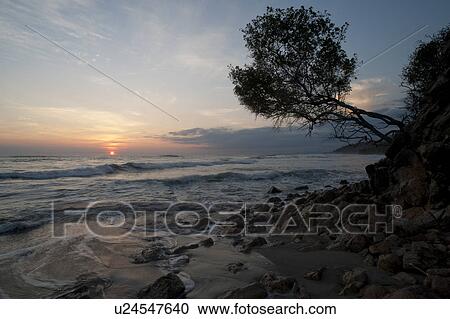 Stock Image - Seascape along Mal Pais coastline in San Jose Costa Rica. Fotosearch
