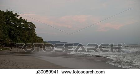 Stock Image - Seascape along Mal Pais coastline in San Jose Costa Rica. Fotosearch