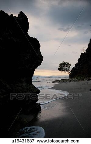 Stock Photo - Seascape along Mal Pais coastline in San Jose Costa Rica. Fotosearch