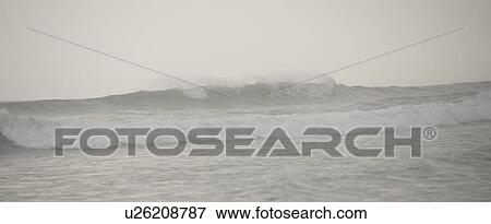 Stock Photo - Seascape along Mal Pais coastline in San Jose Costa Rica. Fotosearch