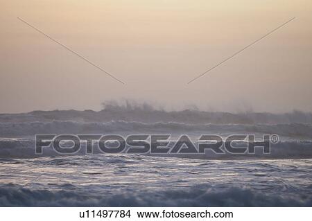 Picture - Seascape with afterglow in San Jose Costa Rica. Fotosearch