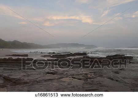 Stock Image - Seascape with afterglow in San Jose Costa Rica. Fotosearch