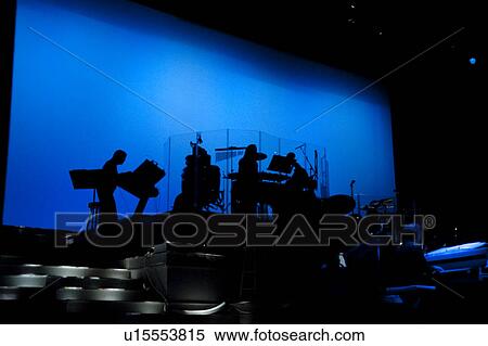 Stock Photography - Silhouette of a band at the Moon River Theatre in Branson, Missouri. Fotosearch