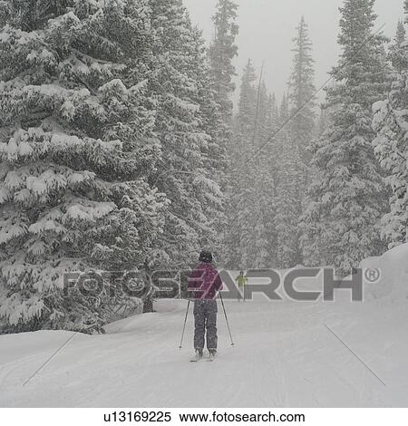 Stock Photography - Skier on a ski slope in Vail, Colorado. Fotosearch