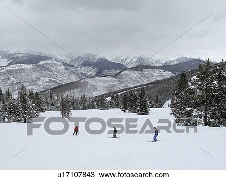 Skiers on a ski slope in Vail, Colorado View Large Photo Image Stock Image - Skiers on a ski slope in Vail, Colorado. Fotosearch