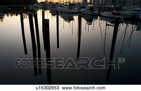 Stock Image - Skyline at dusk in Vancouver, British Columbia, Canada. Fotosearch