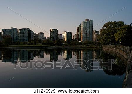 Skyline at dusk in Vancouver, British Columbia, Canada View Large Photo Image Stock Photo - Skyline at dusk in Vancouver, British Columbia, Canada. Fotosearch