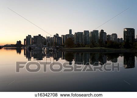 Stock Photo - Skyline at dusk in Vancouver, British Columbia, Canada. Fotosearch