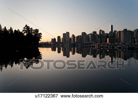 Stock Photo - Skyline at dusk in Vancouver, British Columbia, Canada. Fotosearch