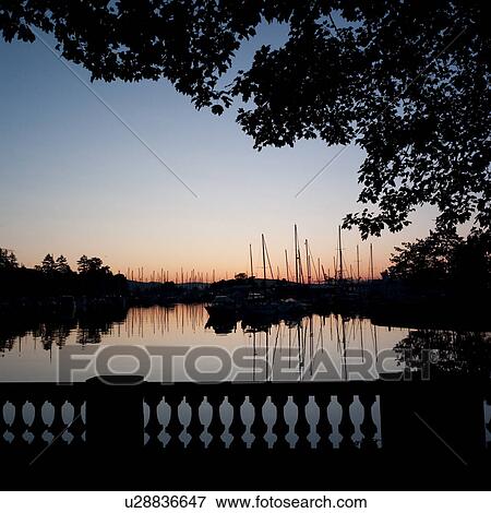 Stock Photo - Skyline at dusk in Vancouver, British Columbia, Canada. Fotosearch