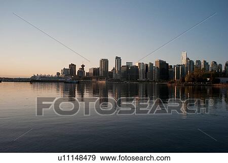 Skyline at twilight in Vancouver, British Columbia, Canada View Large Photo Image Stock Photo - Skyline at twilight in Vancouver, British Columbia, Canada. Fotosearch