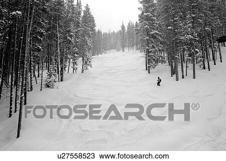 Stock Image - Snow covered mountainside in Vail, Colorado . Fotosearch