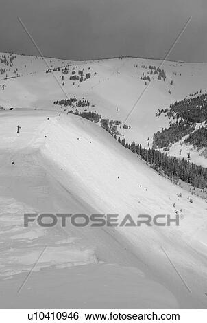 Snow covered mountainside in Vail, Colorado View Large Photo Image Stock Photograph - Snow covered mountainside in Vail, Colorado . Fotosearch