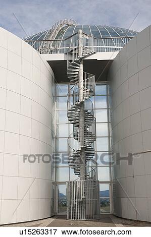 Spiral staircase on the exterior of hot water storage tanks in Iceland View Large Photo Image Stock Photo - Spiral staircase on the exterior of hot water storage tanks in Iceland. Fotosearch