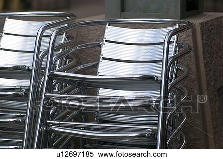 Stock Photography - Stack of metal chairs in Rochester, Minnesota, USA. Fotosearch