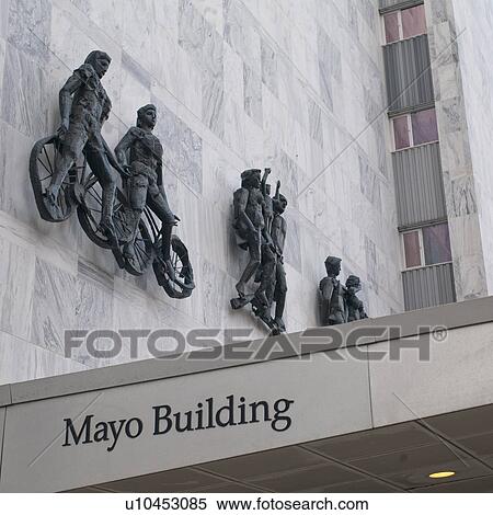 Stock Photography - Statues on the wall of the Mayo Clinic in Rochester, Minnesota, USA. Fotosearch