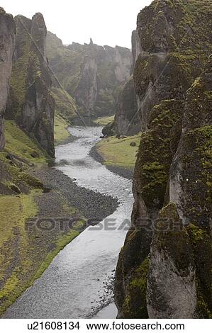Stream at the bottom of a revine in Iceland View Large Photo Image Picture - Stream at the bottom of a revine in Iceland. Fotosearch