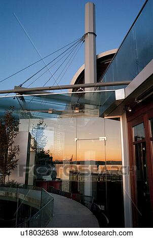 Stock Photo - Sunlight reflecting off a window in Vancouver, British Columbia, Canada. Fotosearch