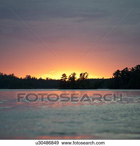 Sunset at Lake of the Woods, Ontario View Large Photo Image Stock Photo - Sunset at Lake of the Woods, Ontario. Fotosearch
