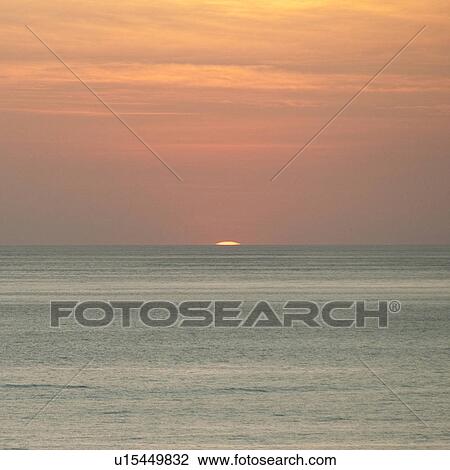 Sunset over Costa Rica coastal waters View Large Photo Image Stock Image - Sunset over Costa Rica coastal waters. Fotosearch