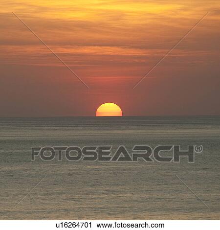 Sunset over Costa Rica coastal waters View Large Photo Image Stock Image - Sunset over Costa Rica coastal waters. Fotosearch