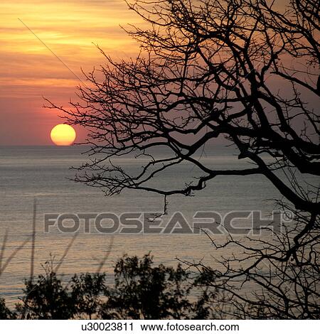 Sunset over Costa Rica coastal waters View Large Photo Image Stock Image - Sunset over Costa Rica coastal waters. Fotosearch
